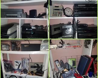 Vast selection of electronics including (but certainly not limited to...) printers, scanners, VCRs, DVD players, VHS rewinders, cameras, routers, tablet keyboards, transceiver, headphones, & more