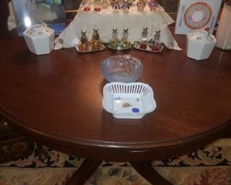 Round, mahogany breakfast table, hand blown glass salt/pepper collection, books, frames, & more.