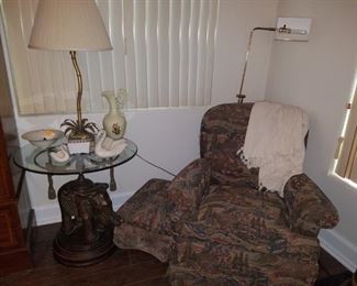 Elephant, metal base with glass top table. Palm table lamp. Accent chair and ottoman, Lenox swans, & other décor