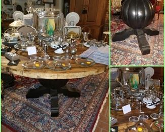 Large round table with solid wood top and metal base. Unique find!