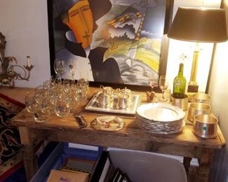 Contemporary framed art, table lamp, primitive table, frames, pewter plates, pewter wine coasters, glasses, & more.
