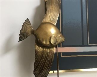 Brass koi fish on a stand