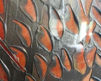 Up close of the relief on the art work