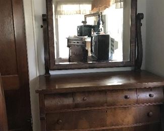 Look at this beautiful empire style dresser with mirror.