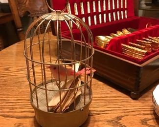 Singing bird in a cage...it works.