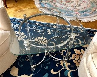 Vintage Lucite and chrome base and glass top.