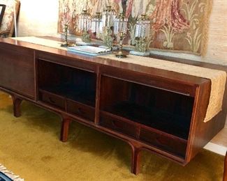 Most spectacular piece. Gianfranco Frattini credenza. This credenza is actually open from both sides - the front, pictured here, features three tambour doors concealing four drawers on the right 2/3 rds and a set of drawers on the left. Open in the back with shelves and 4 drawers - no tambour doors.