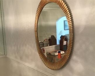 Oval gold mirror