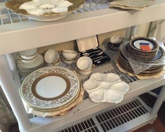 Lots of set of porcelain dishes, chargers, blue cobalt set, some Limoges, oyster plates...