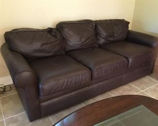 Three seats leatherette brown sofa