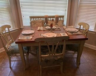 This table was sold. Purchase in New York at Domain Furniture like new as you see it sit four people the oak wood open up and spin around to it sit 6 people. I have the extra chair but not in the picture.