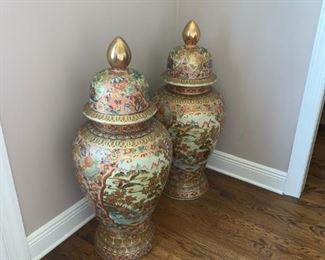 To oriental Vases standing 38 inches tall. They are beautiful design to showcase in corners or a hallway in any home.