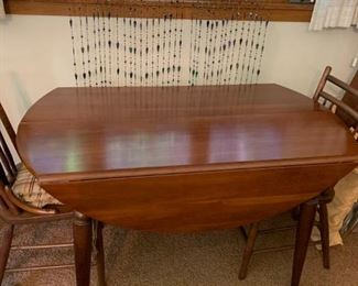 dining table with 4 chair, 2 large leaves and table pads
