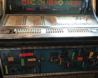  SEEBURG DISCOTHEQUE JUKEBOX:  Model PFEA1U, made from August 1965 to July 1966.  Only 8000 made.  Working order. Many songs from the 60's & 70's. Cosmetically very nice.