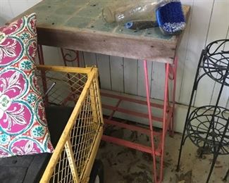 Pink metal table with tile top