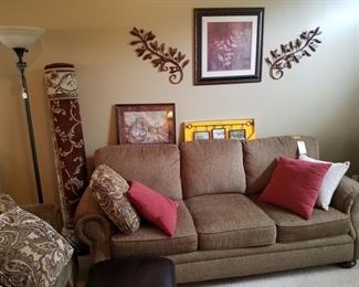 Sofa, Rug, Floor Lamp, Wall Hangings