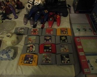 Vintage Nintendo 64 console with games