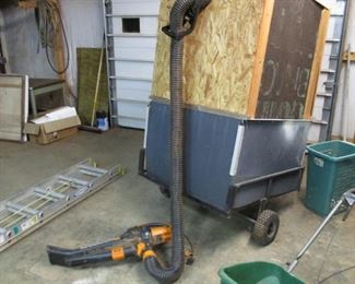 Pull behind trailer and attachment for vacuuming leaves