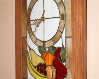 Stain glass wall clock.