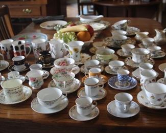 Large selection of tea cups.