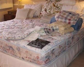 King size bed and linens.