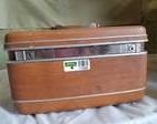 This is an awesome vintage brown Samsonite CarryPak train case that will make the perfect cosmetic or craft case! It is lined with brown detail and has a plastic tray that sets just inside the case to keep your items separate. There are minor scuffs on the exterior. The interior has small areas of the lining separating from the case. It measures 15 x 9 x 8.5 inches.

