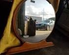This Vintage round mirror appears to be part of a vanity set.
It is in good condition, has ornate details at the top of the frame.
It will add light and style to any room. It appears it can be added back to a vanity set, or taken off the bottom rail and made to be mounted on the wall.