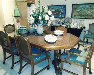 Lenoir dining table and 8 rolling chairs