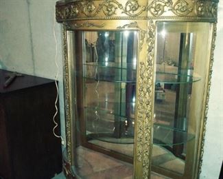 gold curved glass curio