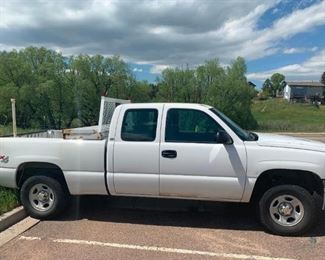 2004 Chevrolet Silverado 4x4 extended cab.  Toolbox, headache rack.  Maintenance records available for the past 2 years.
