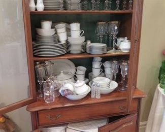 cabinet full or porcelain and glass