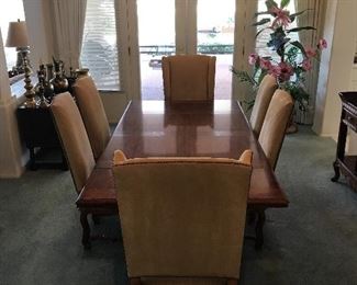 Dining Room Set with 6 chairs and 2 leaves. 1 Buffet and matching side board with wine storage.