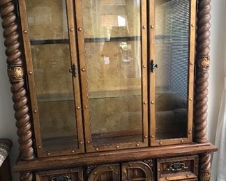 Wood display case with 2 glass shelves, 4 drawers on the bottom plus 2 enclosed shelves for storage. Over 6" tall. Quality furniture!