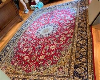 #1		machine rug blue and red 8x10	 $100.00 
