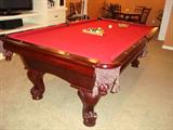 American Heritage pool table (8'3" x 4'7") with accessories (cue sticks, balls, etc.). No scratches on felt. One piece needs glued back on (call for details, simple fix). First $800 takes it away! Looks even better in person!