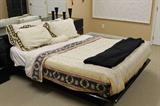 Headboard 66" wide, 30" tall. Has two matching nightstands, armoire and dresser. Someone will get a great deal on this!