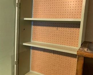 #57 Green Painted Bookshelf w/door w/pegboard inside, whiteboard front 27x11x72 $75.00