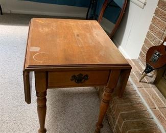 #89 drop side end table with drawer as is $65.00