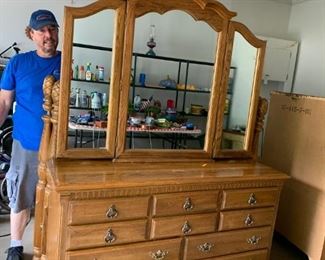 #78 Kincade oak dresser w 10 drawers and by fold mirror 60x19x34 $275.00