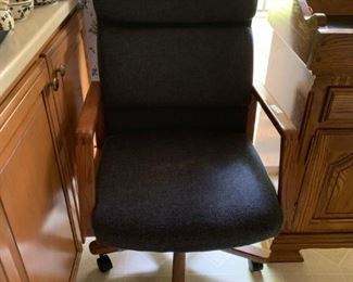 #87 blue desk chair w wood arms $60.00