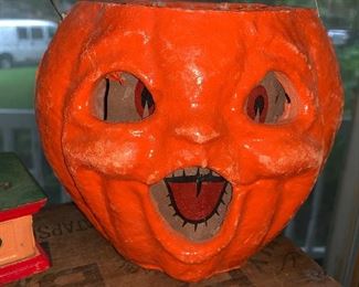 Double faced paper mache pumpkin with original paper insert. 