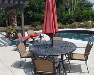 Wentley's Patio Table & 4 Chairs w/ Umbrella purchased from Macy's. Less then 4 years old Excellent Condition!