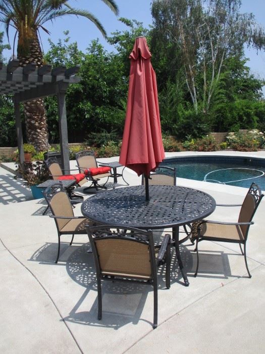 Wentley's Patio Table & 4 Chairs w/ Umbrella purchased from Macy's. Less then 4 years old Excellent Condition!