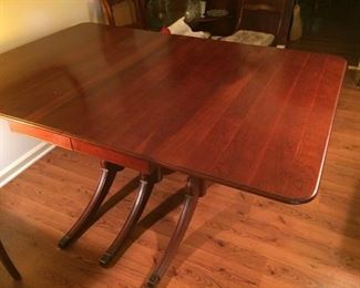 Gorgeous drop leaf table with 2 extra leaves