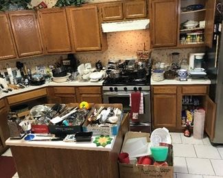 Pots and Pans and Gadgets.  Cabinets are full of 50 cent items too!