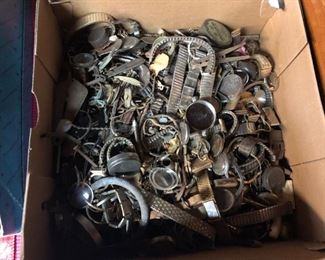 Box of vintage wrist watch parts
