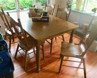 Blonde rectangle table w/ 2 leaves
5 chairs