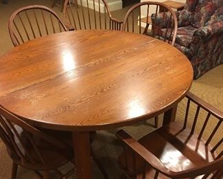 Table with large leaf. 6 Windsor chairs. 4 Arm and 2 Straight. 