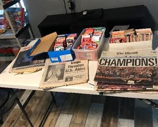 Baseball cards and newspapers