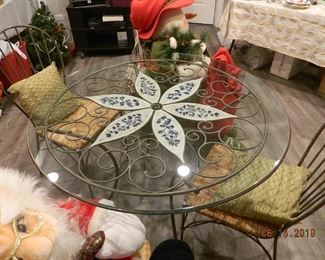 glass table with four chairs